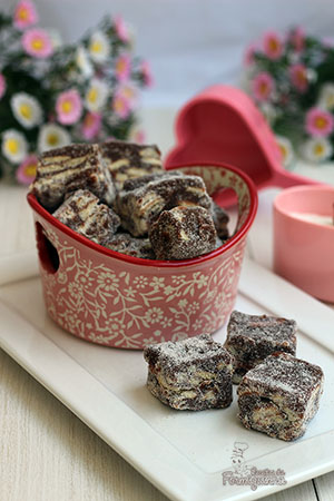 Quadradinhos deliciosamente macios de brigadeiro e biscoitos.. Palha Italiana de Chocolate é um doce simples e fácil de preparar..